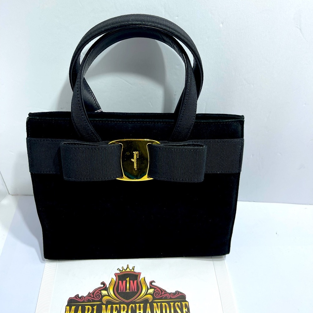 Salvatore Ferragamo Hand Bag in black suede.
